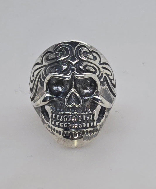 STERLING SILVER PATTERN 26MM SKULL RING.