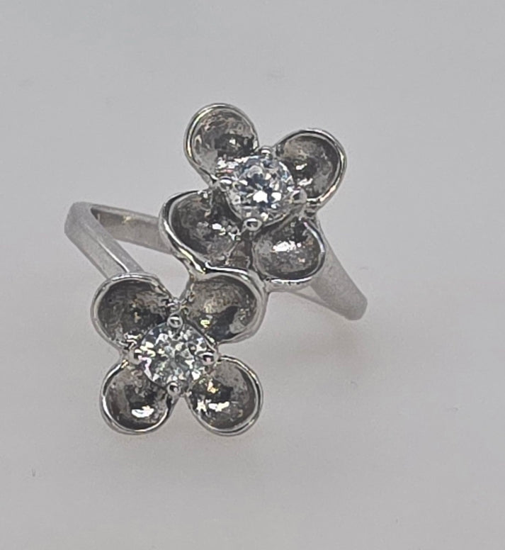STERLING SILVER DOUBLE FLOWER WITH 4MM ROUND CUBIC ZIRCONIA CENTER RING FINGER SIZE N.