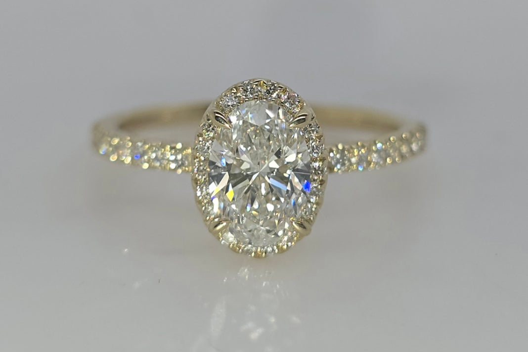 9CT YELLOW GOLD 1.25CT LAB GROWN DIAMOND HALO RING.