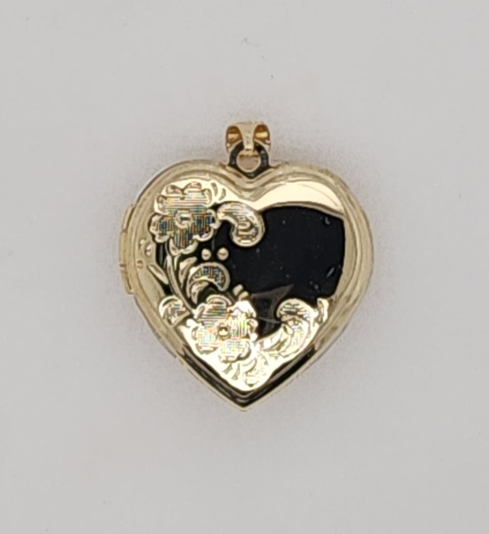 9CT YELLOW GOLD 21MM HEART LOCKET WITH FLORAL PATTERN.