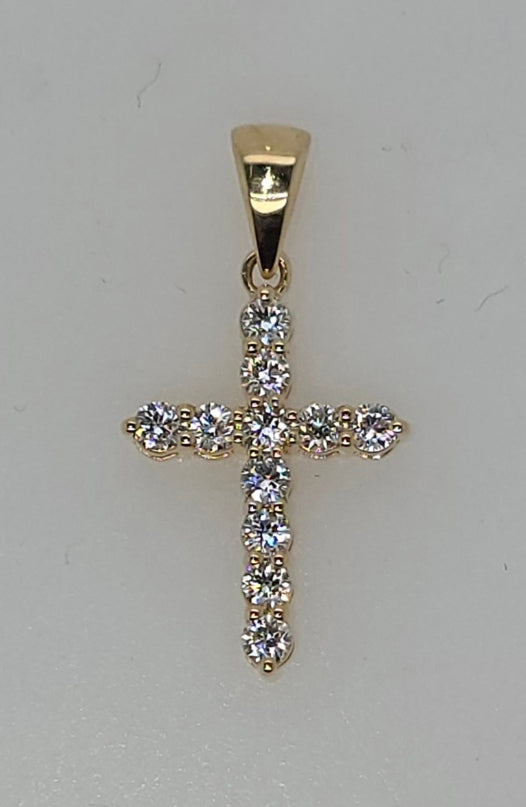 18CT YELLOW GOLD CLAW SET DIAMOND CROSS PENDANT.