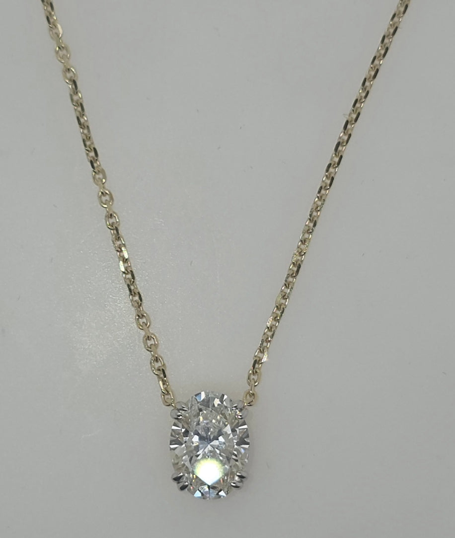 9CT YELLOW GOLD LAB DIAMOND OVAL PENDANT NECKLACE.