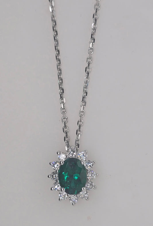 9CT WHITE GOLD LAB EMERALD AND DIAMOND PENDANT.