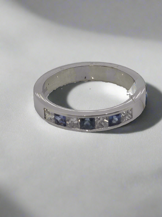 18CT WHITE GOLD DIAMOND AND CEYLON SAPPHIRE CHANNEL SET RING