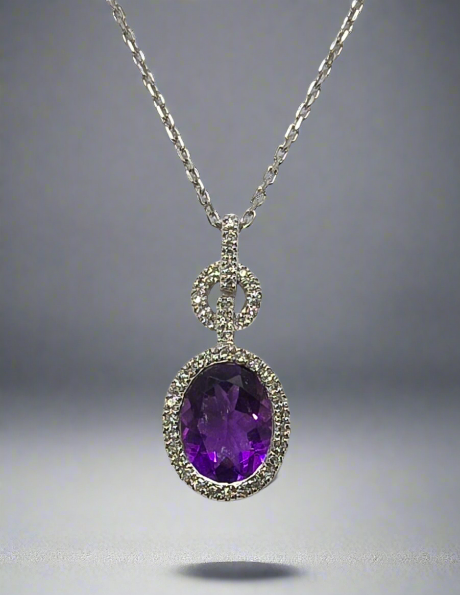 9CT WHITE GOLD OVAL AMETHYST AND DIAMOND PENDANT