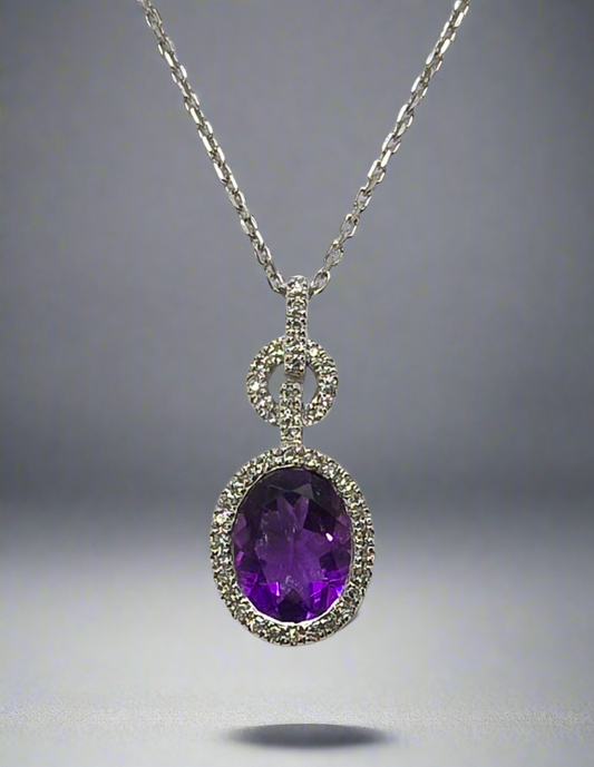 9CT WHITE GOLD OVAL AMETHYST AND DIAMOND PENDANT