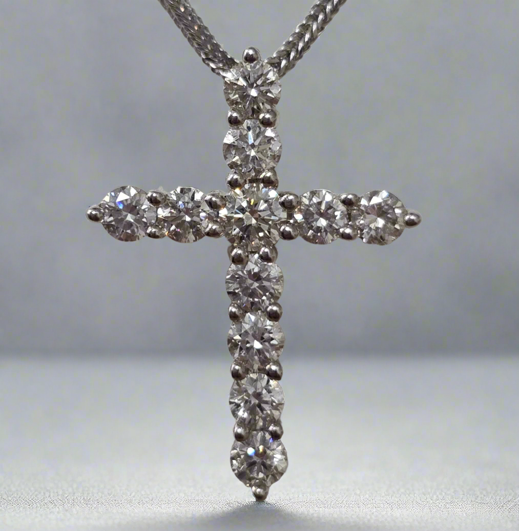 18CT WHITE GOLD CLAW SET DIAMOND CROSS PENDANT