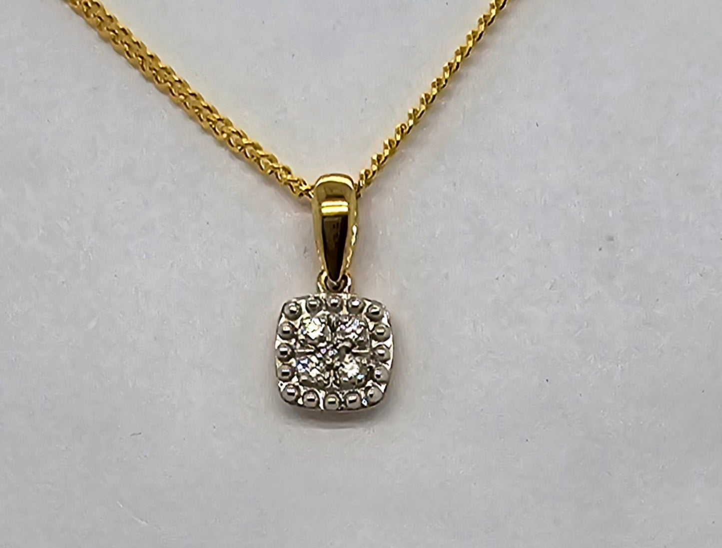 9CT YELLOW GOLD CUSHION SHAPE DIAMOND PENDANT