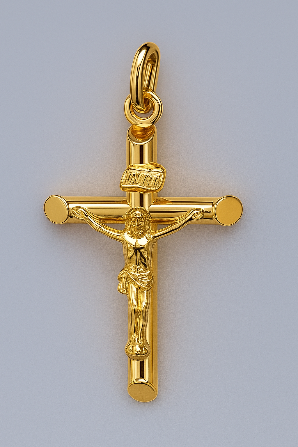 9CT YELLOW GOLD ITALIAN POLISHED TUBULAR CRUCIFIX.