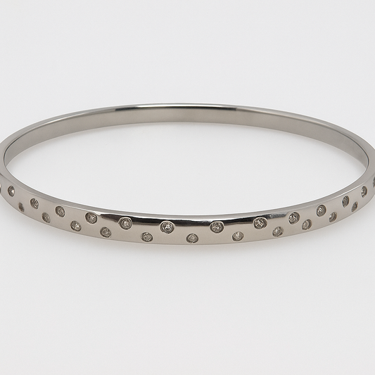 9CT WHITE GOLD SOLID OVAL DIAMOND BANGLE