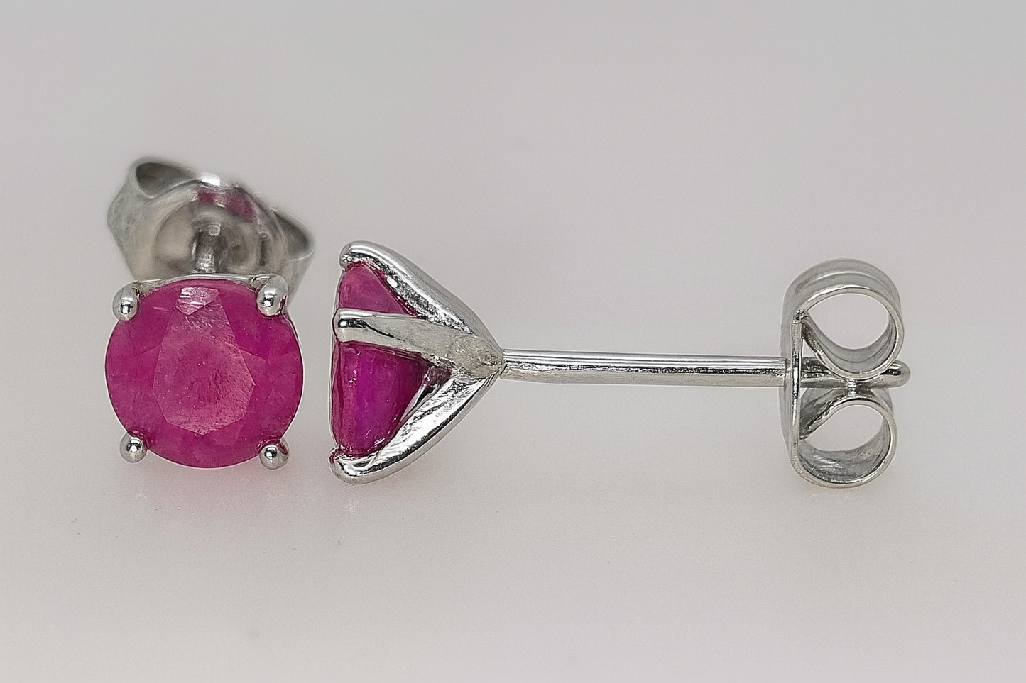 9CT WHITE GOLD CLAW SET 5MM ROUND RUBY STUD EARRINGS