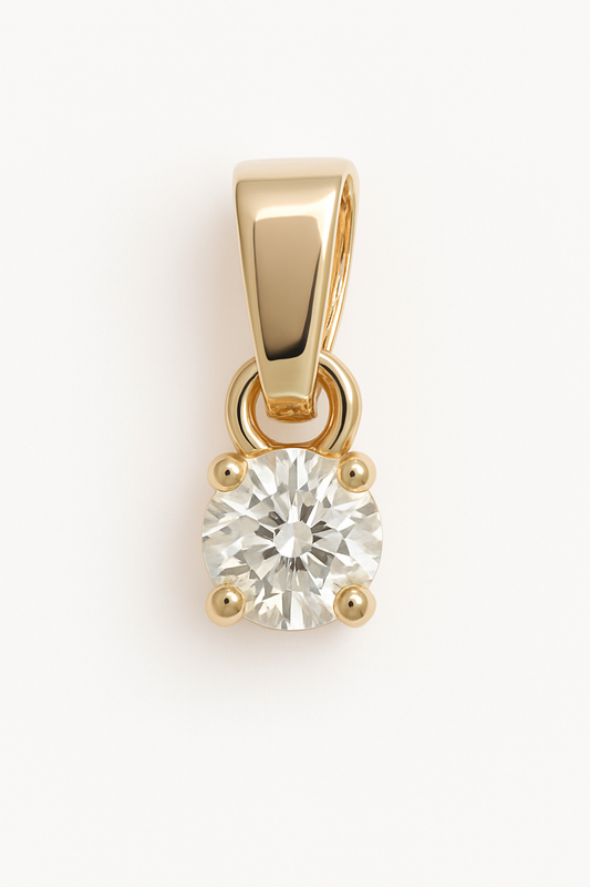 9CT YELLOW GOLD 4 CLAW SET ROUND BRILLIANT CUT DIAMOND SOLITAIRE 0.15CT PENDANT.