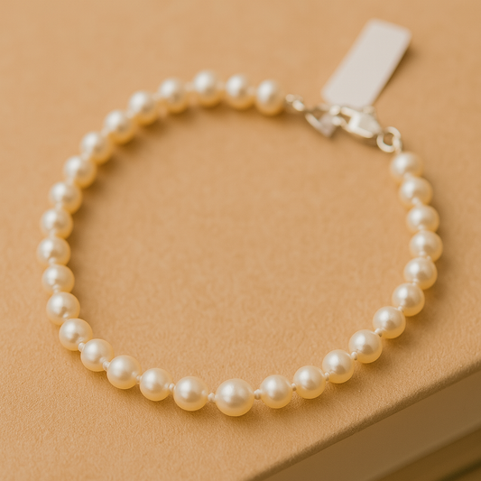 FRESHWATER 4.5-5MM PEARL 19CM BRACELET WITH STERLING SILVER CLASP.