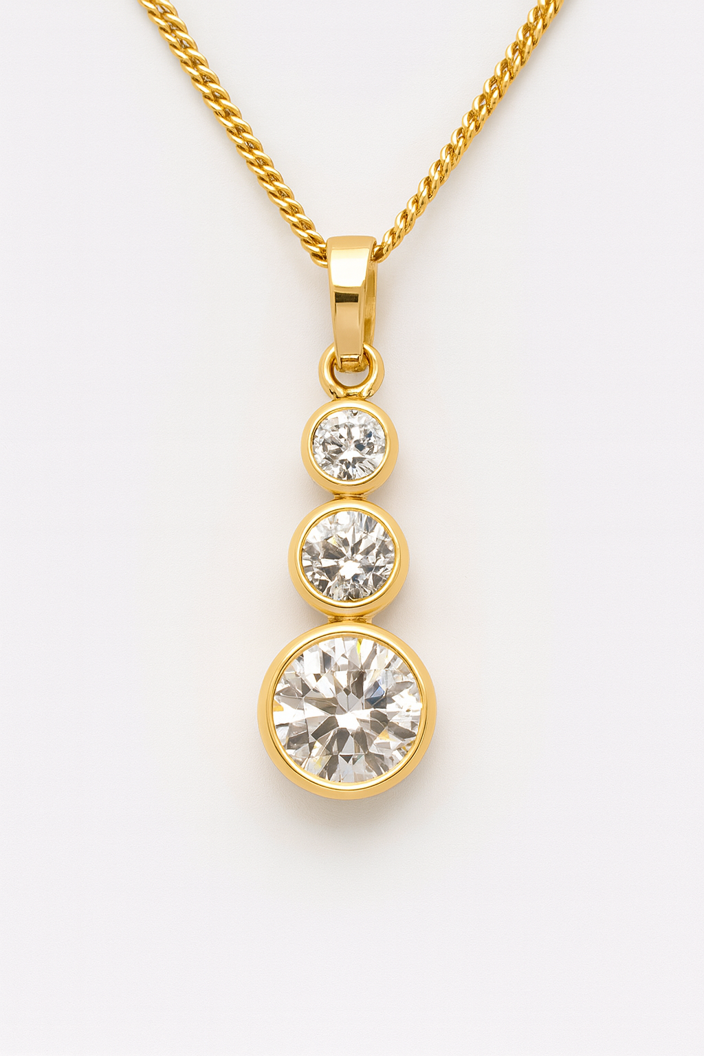 9CT YELLOW GOLD BEZEL SET 3 X ROUND CUBIC ZIRCONIA PENDANT