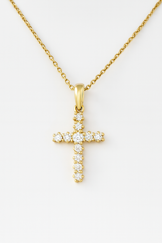 18CT YELLOW GOLD CLAW SET DIAMOND CROSS.