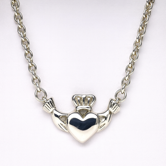 STERLING SILVER 56CM SOLID CLADDAGH PENDANT WITH ATTACHED CABLE CHAIN 14.1GRAMS