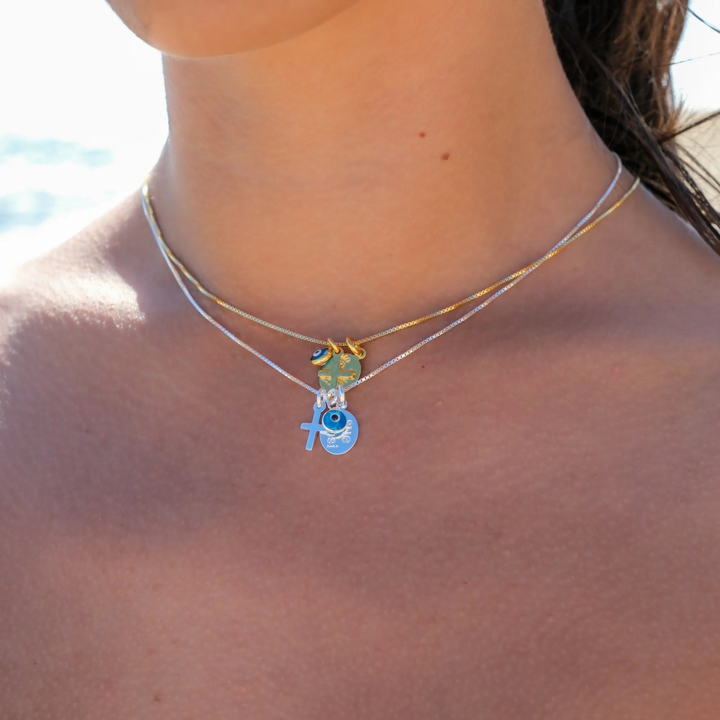 SUE SENSI STERLING SILVER GOLD PLATED REACH FOR THE SKY CROSS NECKLACE.