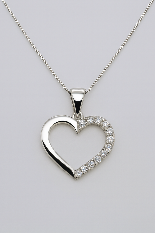 9CT WHITE GOLD CUBIC ZIRCONIA OPEN HEART PENDANT.