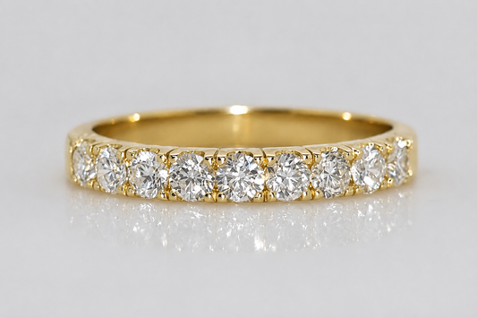 18CT YELLOW GOLD CLAW SET DIAMOND RING.