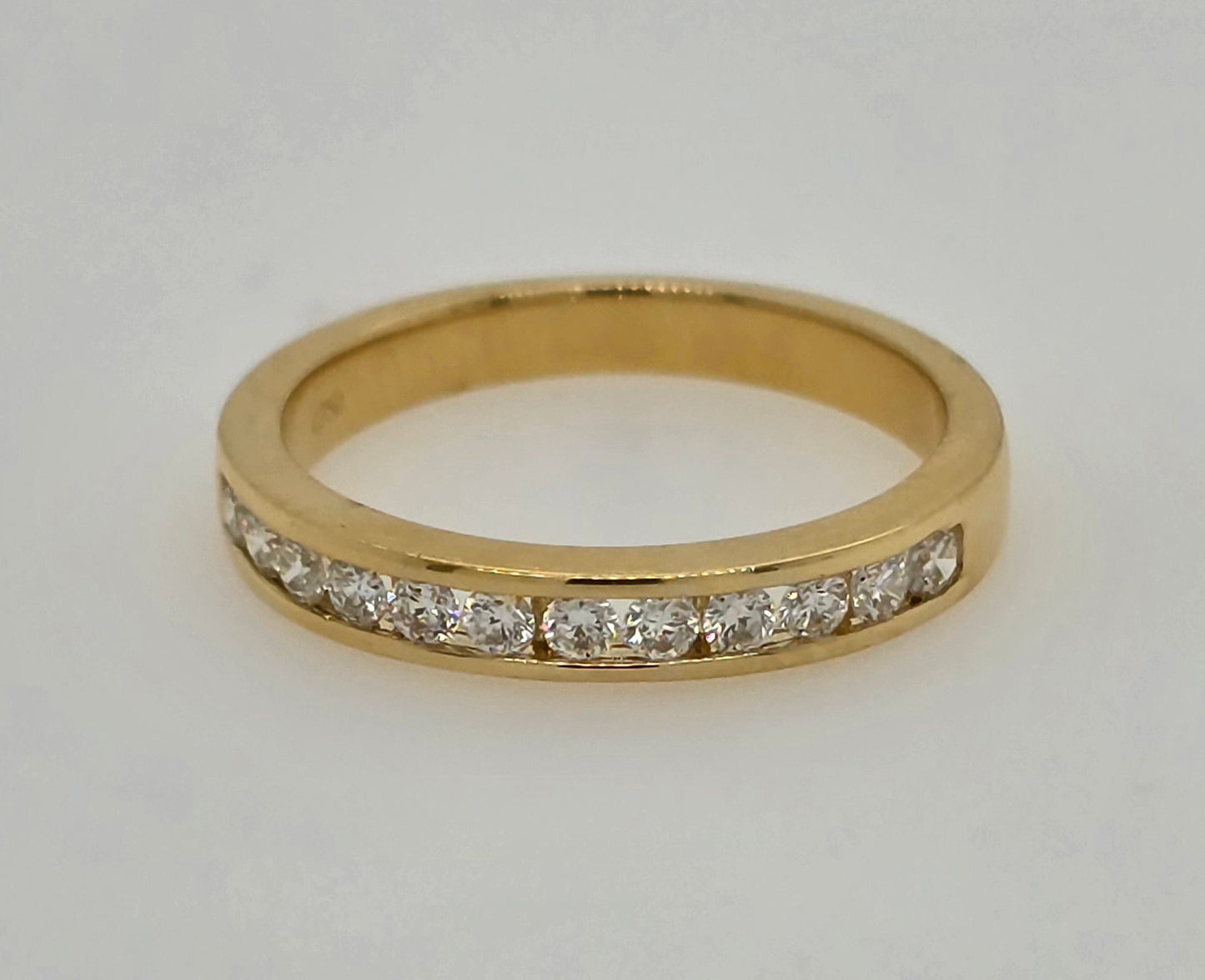 18CT YELLOW GOLD CHANNEL SET DIAMOND RING