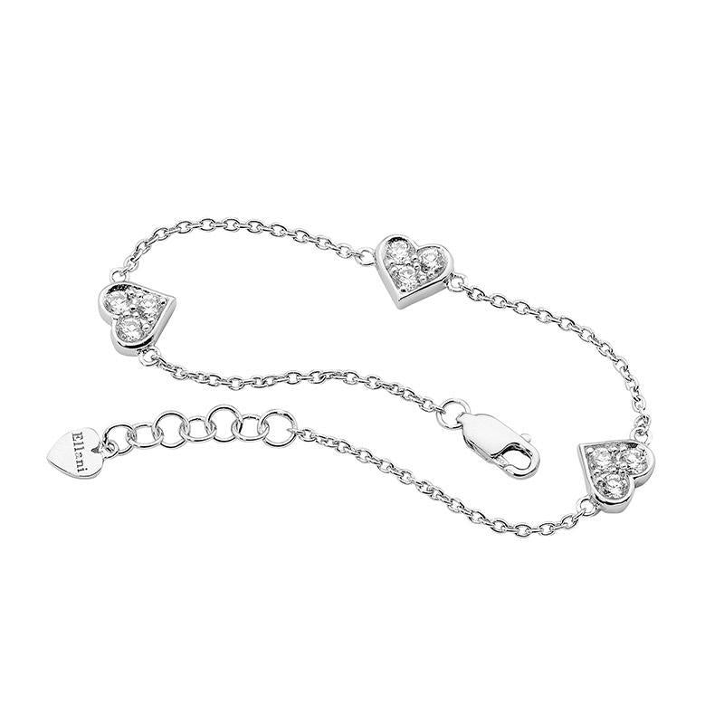 ELLANI STERLING SILVER RHODIUM PLATED CUBIC ZIRCONIA 3 HEART BRACELET. B214S