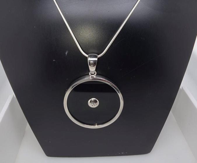 STERLING SILVER 35MM ROUND ONYX AND DIAMOND PENDANT