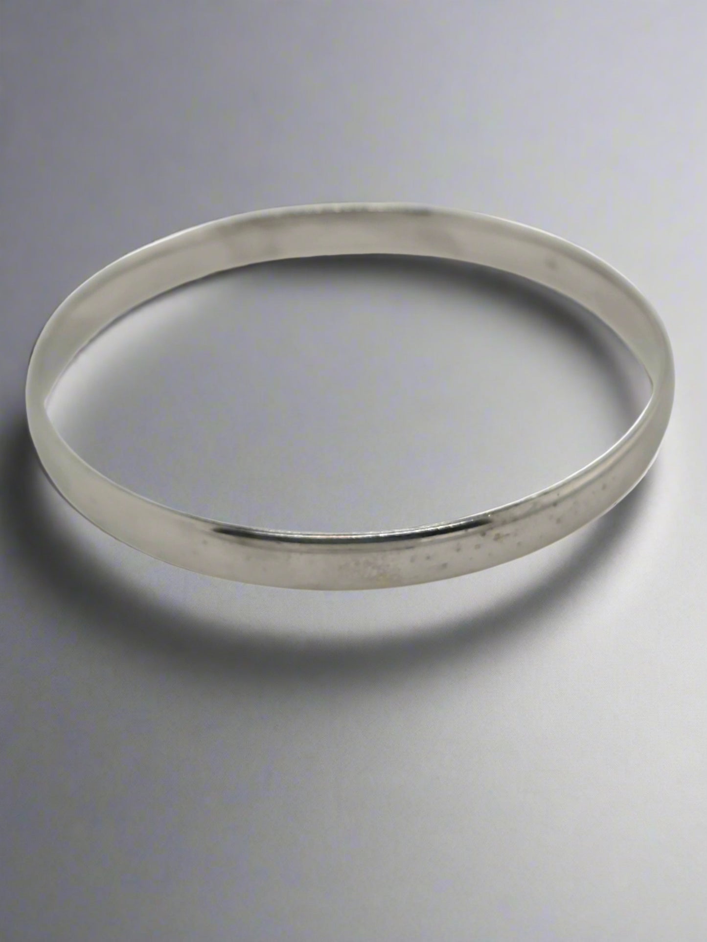 9CT WHITE GOLD 7X66MM 30.7GRAM COMFORT FIT BANGLE