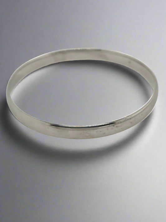 9CT WHITE GOLD 7X66MM 30.7GRAM COMFORT FIT BANGLE