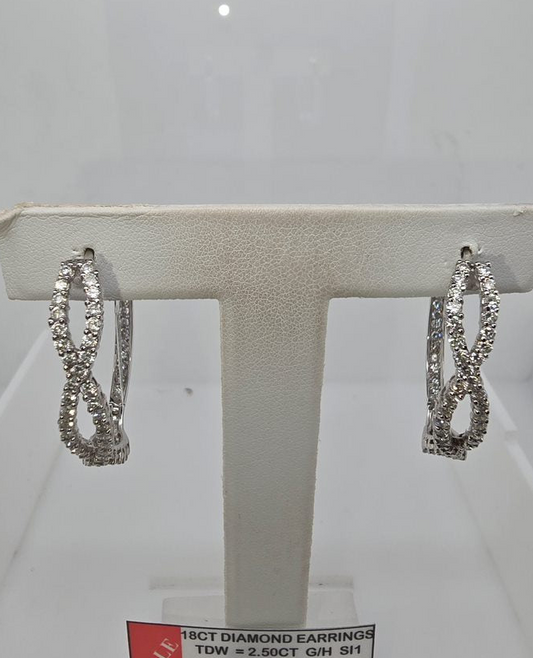 18CT WHITE GOLD DIAMOND HOOP CLAW SET CROSS OVER EARRINGS