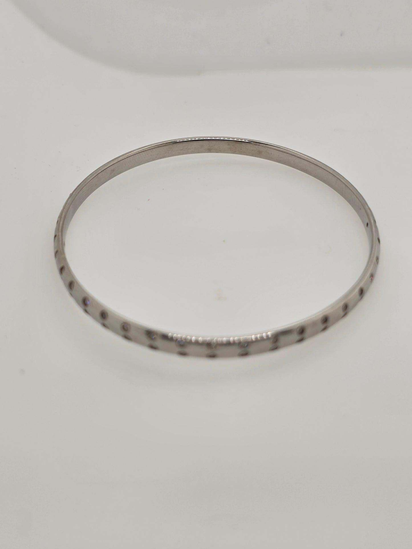 9CT WHITE GOLD SOLID OVAL DIAMOND BANGLE