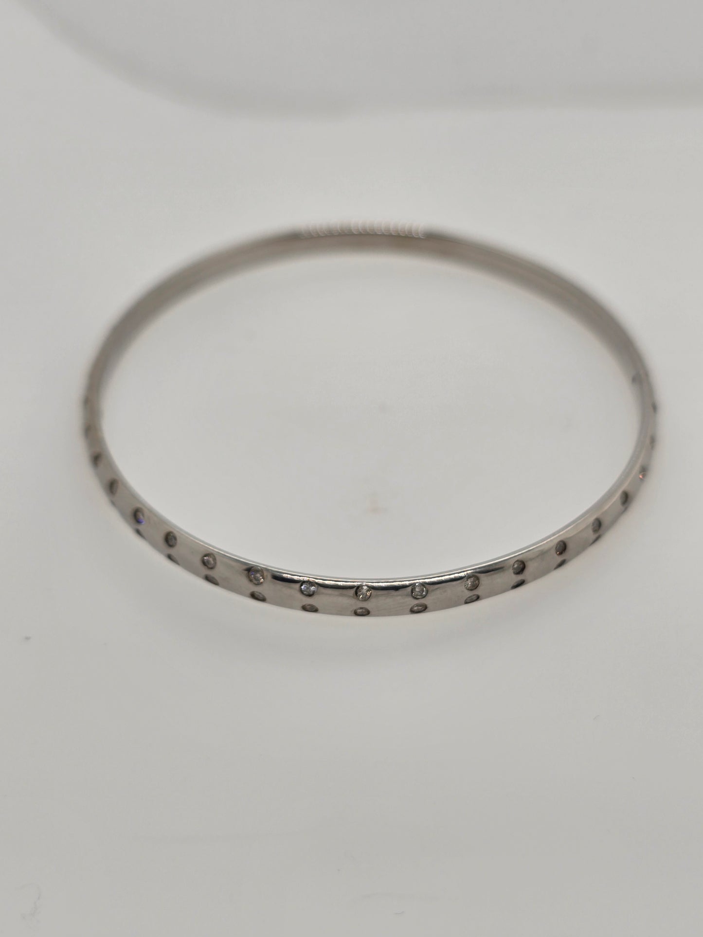 9CT WHITE GOLD SOLID OVAL DIAMOND BANGLE