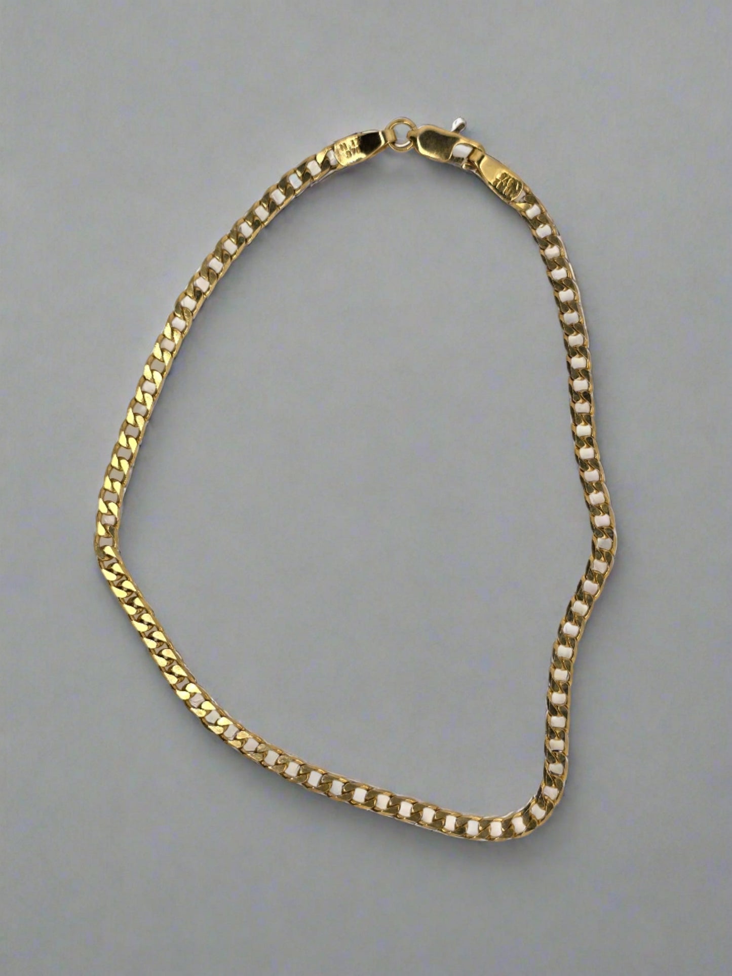 9CT YELLOW GOLD IMPORTED 21CM CURB BRACELET