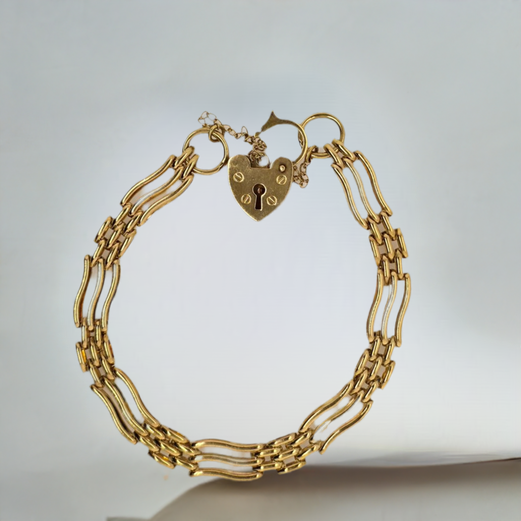 18CT YELLOW GOLD 18CM 3 BAR GATE BRACELET WITH HEART PADLOCK