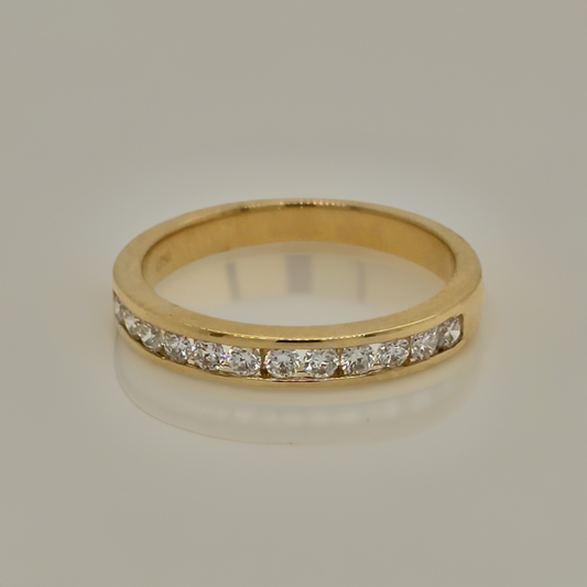 18CT YELLOW GOLD CHANNEL SET DIAMOND RING