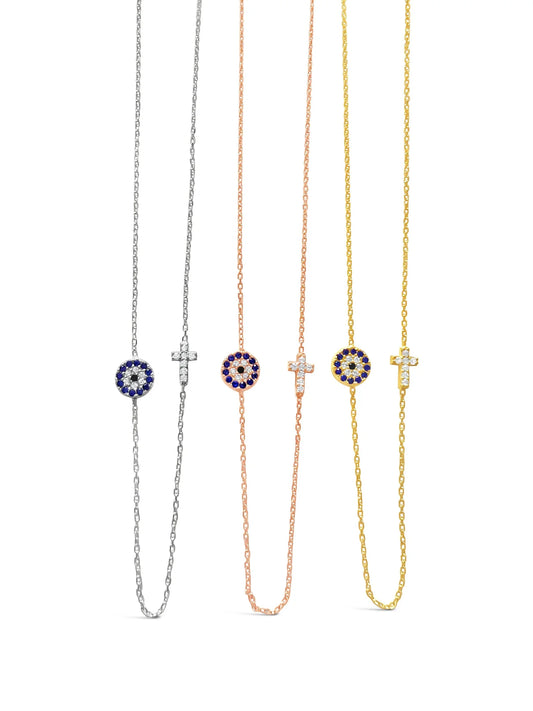 SUE SENSI STERLING SILVER HOLD ONTO PEACE NECKLACE WITH CUBIC ZIRCONIA EVIL EYE AND CROSS.