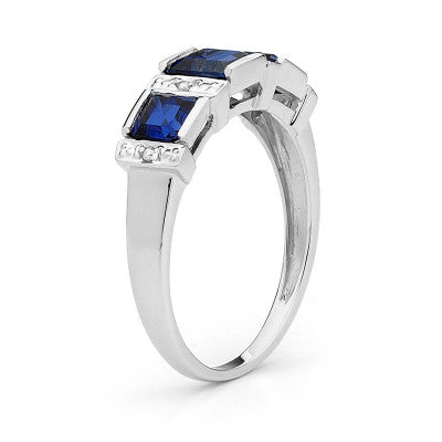 9CT WHITE GOLD CREATED SAPPHIRE AND DIAMOND RING